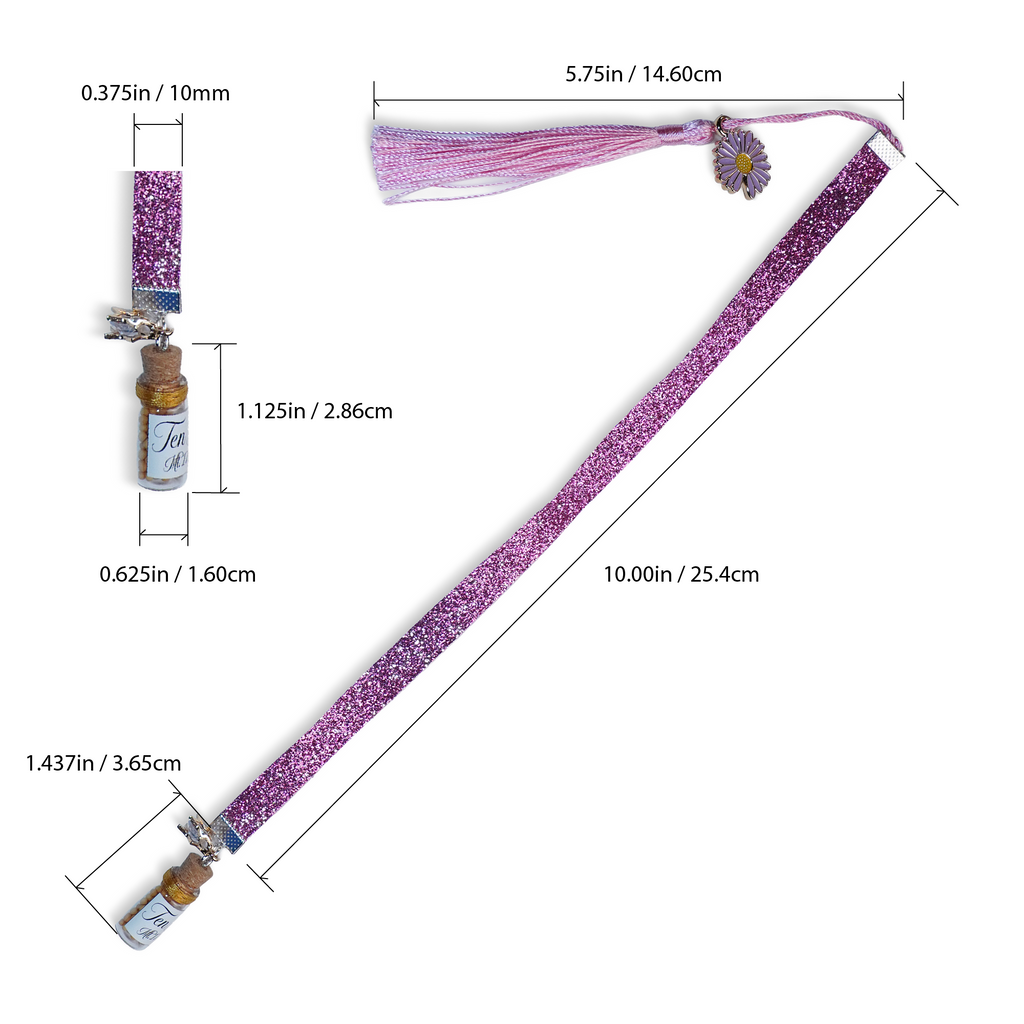 Separador de liston color rosa brillante con borla, coldije y frasco con semillas de mostaza